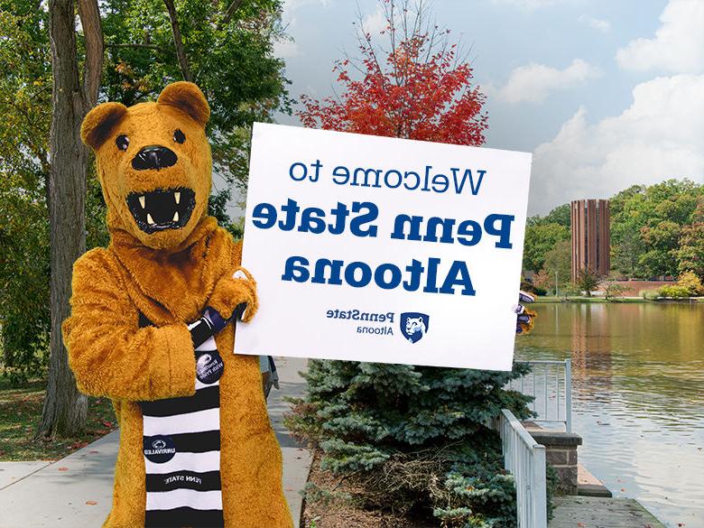 The Nittany Lion mascot holding up a sign reading Welcome to <a href='http://y88qw.goudounet.com'>十大网投平台信誉排行榜</a>阿尔图纳分校